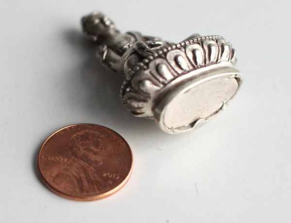 Sterling Silver Tiny Ratnasambhava Buddha Statue